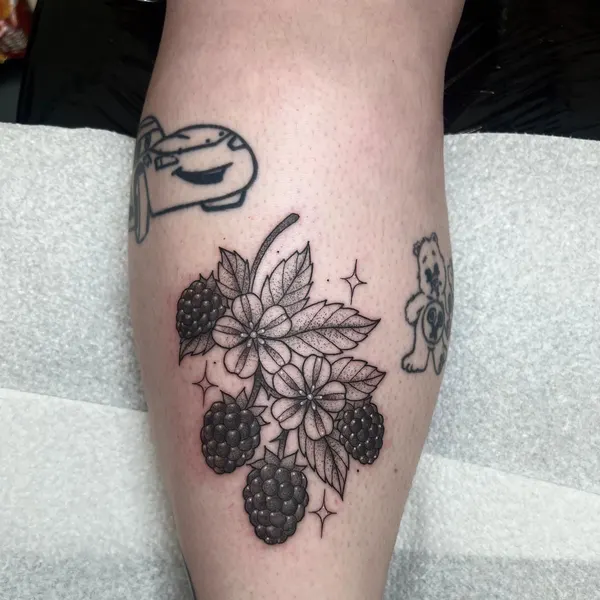 blackwork blackberries with blossoms, leaves and sparkles, calf piece, by ashlee at shade studio peterborough
